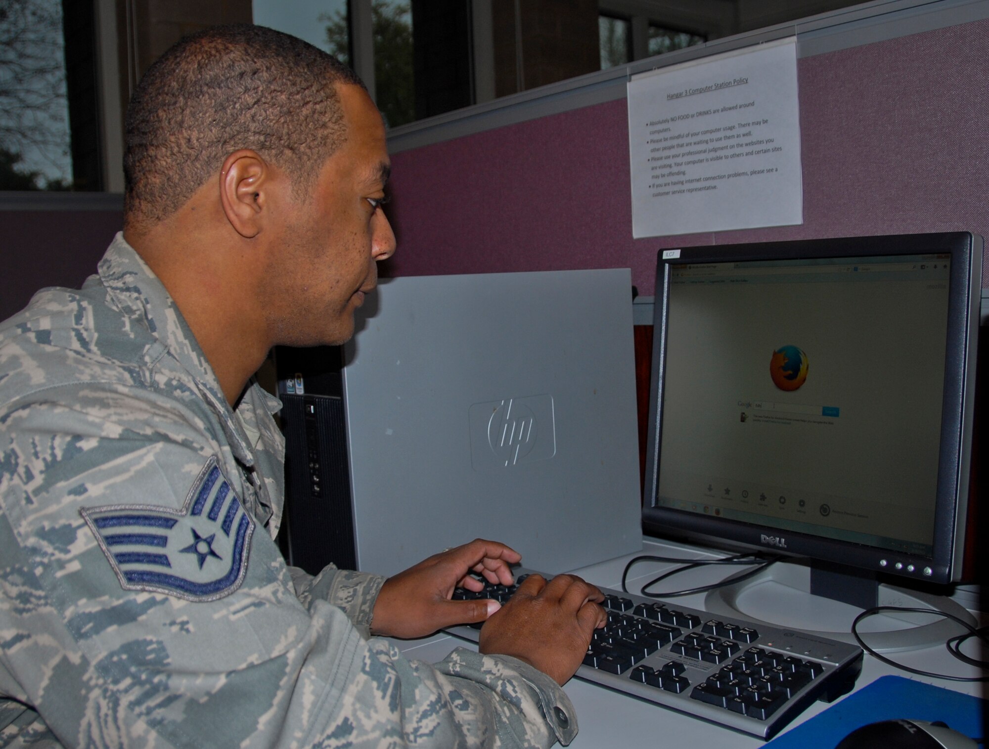 Staff Sgt. Sean Gray, of the 96th Force Support Squadron, works on a computer at Hangar 3, Eglin’s new digital library. It is part of Community Commons, which combines access to FSS programs and information into one convenient location. (U.S. Air Force photo/Kevin Gaddie)