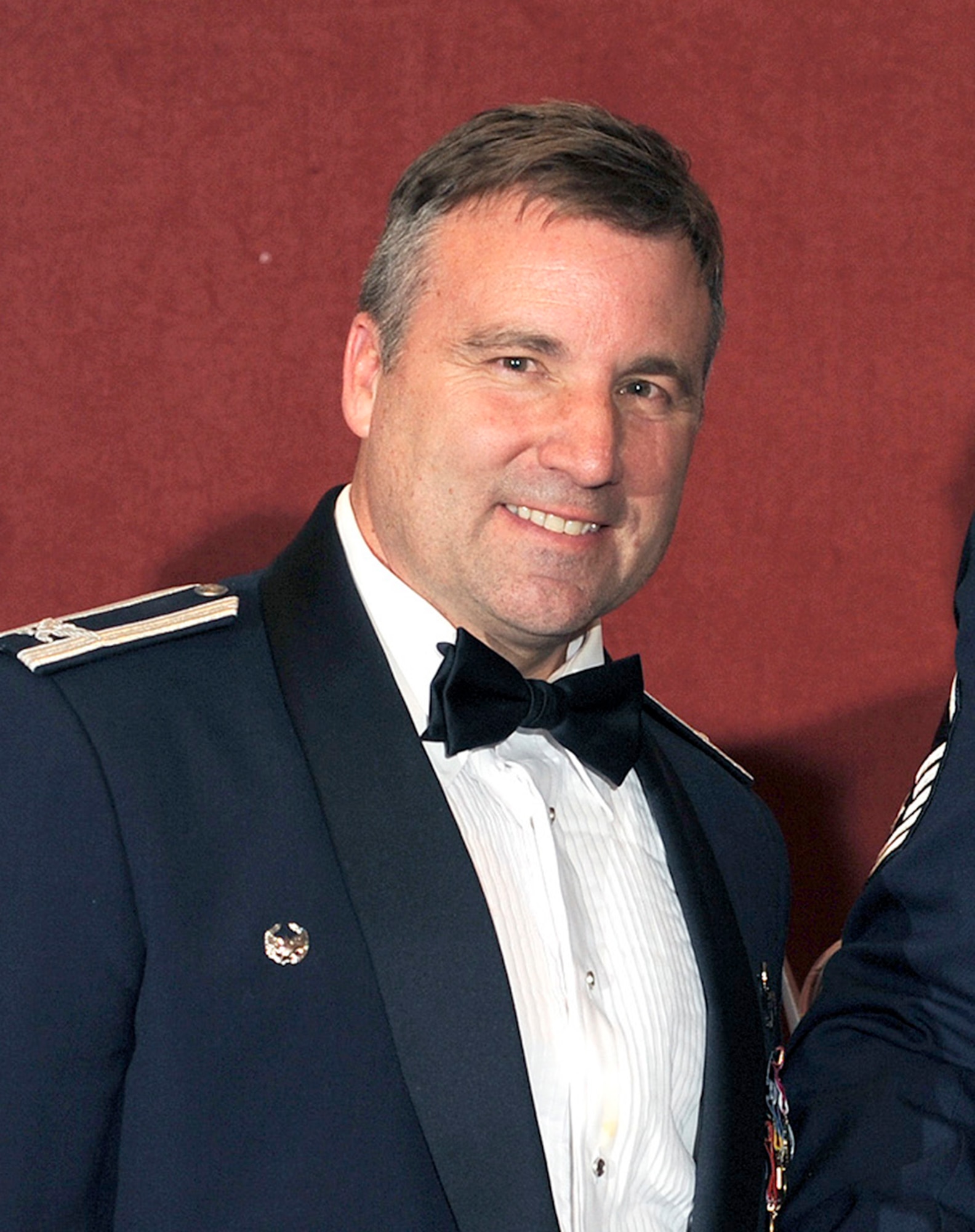 Air Force Reserve Col. (ret.) Mark Hustedt, pictured here at the 310th Space Wing's 2010 annual awards banquet, served as the wing's vice commander from September 2008 to December 2011. He also commanded the 6th Space Operations Squadron, charged with being the operational backup to the Defense Metrologic Satellite Program. (Air Force photo)