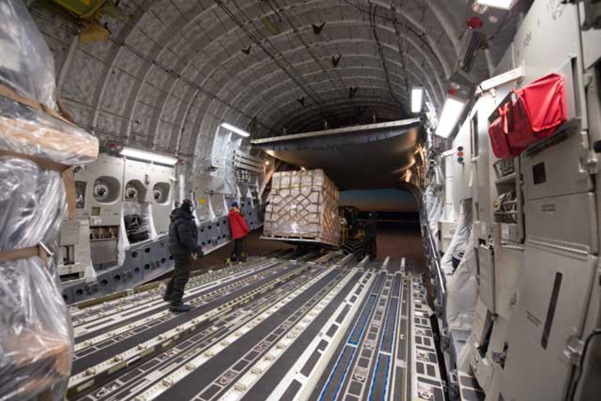Cargo is unloaded from a McChord C-17at McMurdo Station, Antarctica  (Courtesy photo by Alasdair Turner)