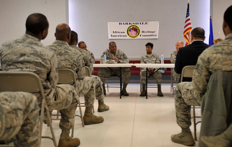 Chief Master Sgt. Freddie Flowers, 2nd Civil Engineering Squadron superintendent, addresses Airmen at the African American Heritage Committee Chief's Forum on Barksdale Air Force Base, Feb. 26, 2014. Airmen asked questions to the panel of chief master sergeants about how to appropriately address issues they deal with. (U.S. Air Force photo/Airman 1st Class Benjamin Raughton)
