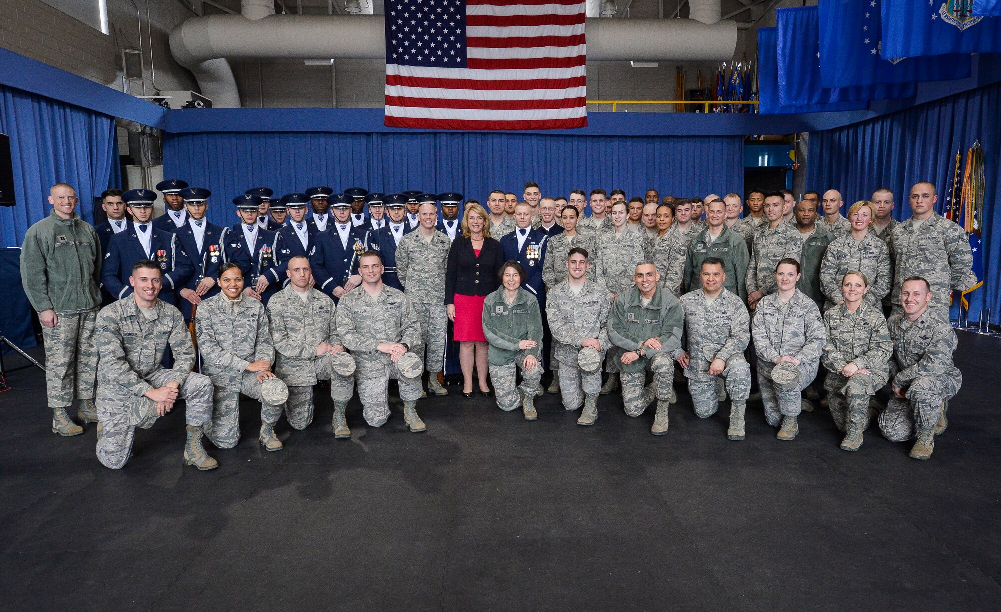 Secretary of the Air Force Deborah Lee James poses for a photo with members of The U.S. Air Force Honor Guard, Air Force District of Washington leadership and 11th Wing leadership during an immersion tour at Joint Base Anacostia-Bolling, D.C., Feb. 7, 2014. The vision of the USAF Honor Guard is to ensure a legacy of Airmen who promote the mission, protect the standards, perfect the image and preserve the heritage of the organization. (U.S. Air Force photo/Jim Varhegyi)