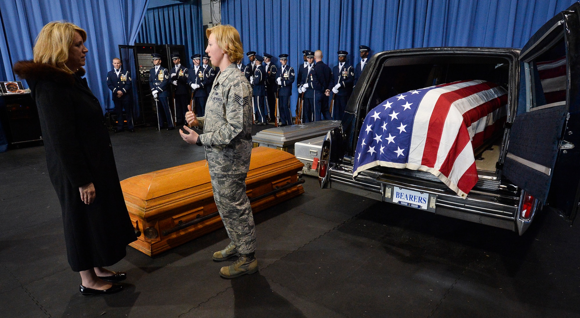 Staff Sgt. April Spilde explains the The U.S. Air Force Honor Guard Body Bearers’ mission to Secretary of the Air Force Deborah Lee James at Joint Base Anacostia-Bolling, D.C., Feb. 7, 2014. Spilde is a USAF Honor Guard Body Bearer. The Body Bearers Flight participates in U.S. Air Force, joint service and state funerals by carrying the remains of deceased service members, their dependents and senior or national leaders to their final resting places at Arlington National Cemetery.  (U.S. Air Force photo/Jim Varhegyi)