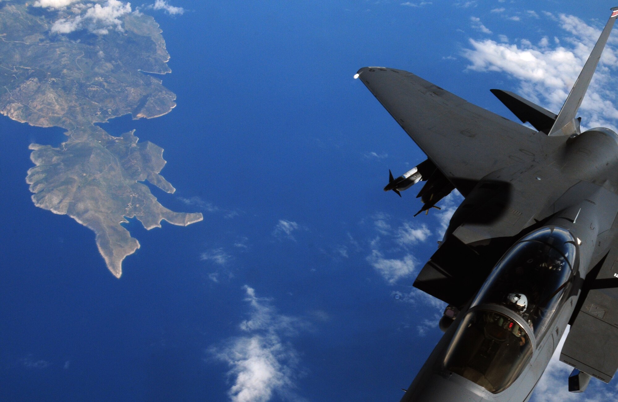 Captain Lloyd Wright, F-15E Strike Eagle pilot, and Capt. Clayton Couch, F-15E Strike Eagle weapons systems officer, fly in a training mission over the Mediterranean Sea, Feb. 26, 2014. More than 250 Airmen from the 494th Fighter Squadron are deployed to Souda Air Base on the island of Crete for NATO training with the Hellenic air force. (U.S. Air Force photo by Staff Sgt. Thomas Trower/Released)