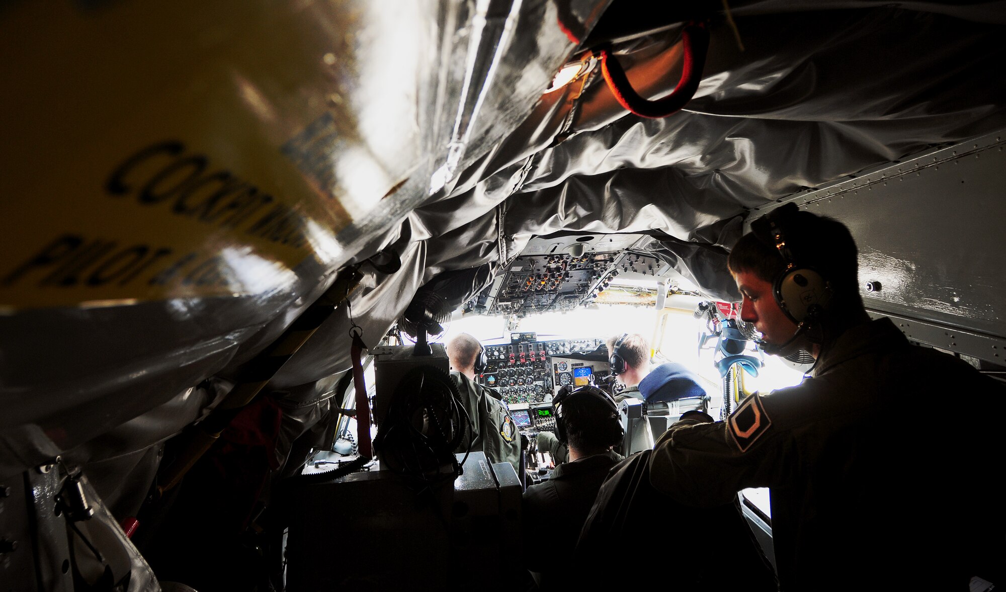 Staff Sgt. Andrew Valence, 351st Air Refueling Squadron boom operator, performs pre-flight checks on a KC-135 Stratotanker, Feb. 26, 2014. The squadron, based out of Royal Air Force Mildenhall, England, sent a KC-135 to support NATO training with the Hellenic air force in Souda Bay, Greece. (U.S. Air Force photo by Staff Sgt. Thomas Trower/Released)