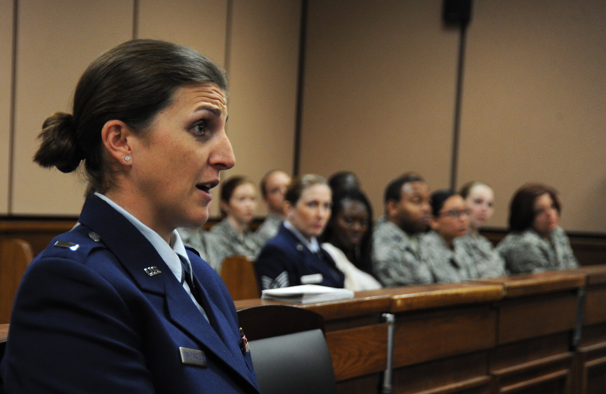 1st Lt. Heather Van Pinxteren, 325th Force Support Squadron readiness officer shares her views during a mock trial Feb. 25 at the base support court room. “Grey Matters” was a realistic, condensed sexual assault trial and intended to teach the audience as well as the jury, the proceedings and intensity of an actual court-martial and how grey the area of consent is. (U.S. Air Force photo by Airman 1st Class Alex Echols)