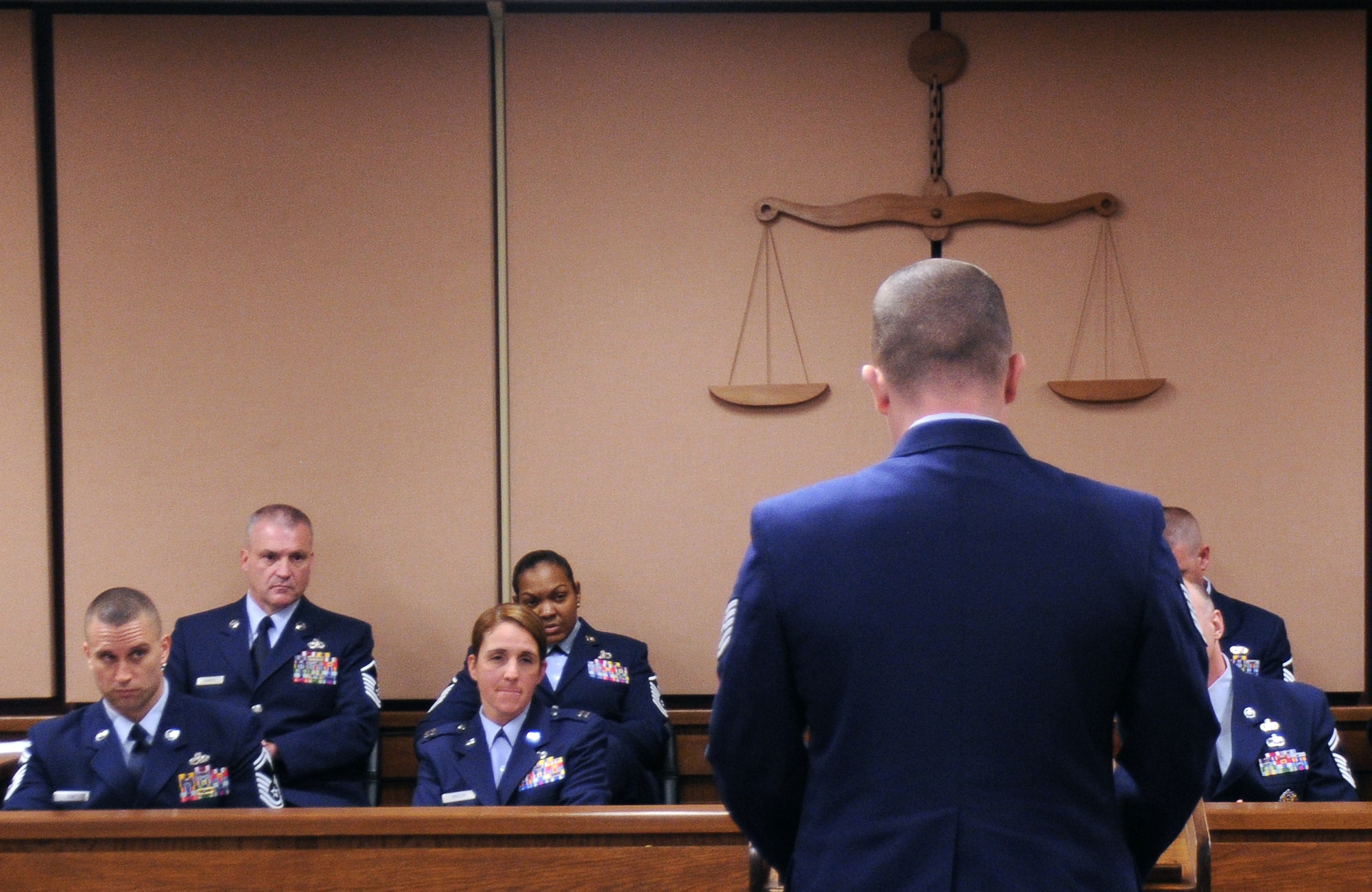 The accused expresses his apology and pleads to the jury for a lighter sentence during a mock trial Feb. 25 at the base support court room. “Grey Matters” was a realistic, condensed sexual assault trial and intended to teach the audience as well as the jury, the proceedings and intensity of an actual court-martial and how grey the area of consent is. (U.S. Air Force photo by Airman 1st Class Alex Echols)