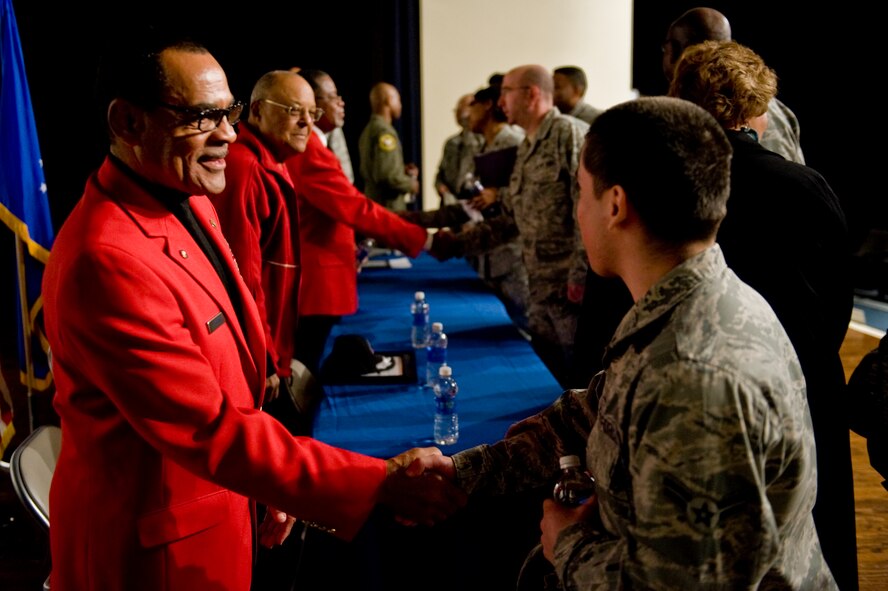 Tuskegee Airmen of the Wilson V. Eagleson Chapter, located in the city of Goldsboro, N.C., shake hands with service members during a forum entitled “Civil Rights in America: Then to Now,” Feb. 26, 2014, at Seymour Johnson Air Force Base, N.C.  During the forum, Airmen past and present discussed advances the military has made in promoting a more equal and diverse environment. (U.S. Air Force photo/Airman 1st Class Brittain Crolley)