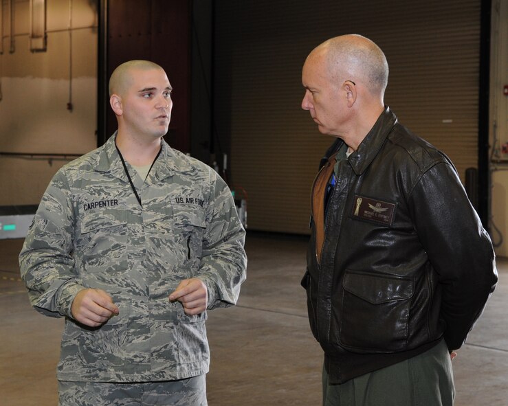 Staff Sgt. Keith Carpenter, 2nd Munitions Squadron, takes Brig. Gen. Michael Fortney, Air Force Global Strike Command director of operations, on a tour of the cruise missile flight on Barksdale Air Force Base, La., Feb. 25, 2014. Fortney visited the 2nd MUNS as part of an immersion tour of the 2nd Bomb Wing. (U.S. Air Force photo/Senior Airman Joseph A. Pagán Jr.)