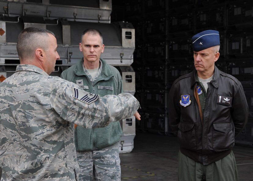 Senior Master Sgt. Dylan Williams, 2nd Munitions Squadron, Col. David Foote, 2nd Maintenance Group commander and Brig. Gen. Michael Fortney, Air Force Global Strike Command director of operations, discuss the uses of the weapons storage facilities on Barksdale Air Force Base, La., Feb. 25, 2014. Fortney visited the 2nd MUNS as part of an immersion tour of the 2nd Bomb Wing. (U.S. Air Force photo/Senior Airman Joseph A. Pagán Jr.)