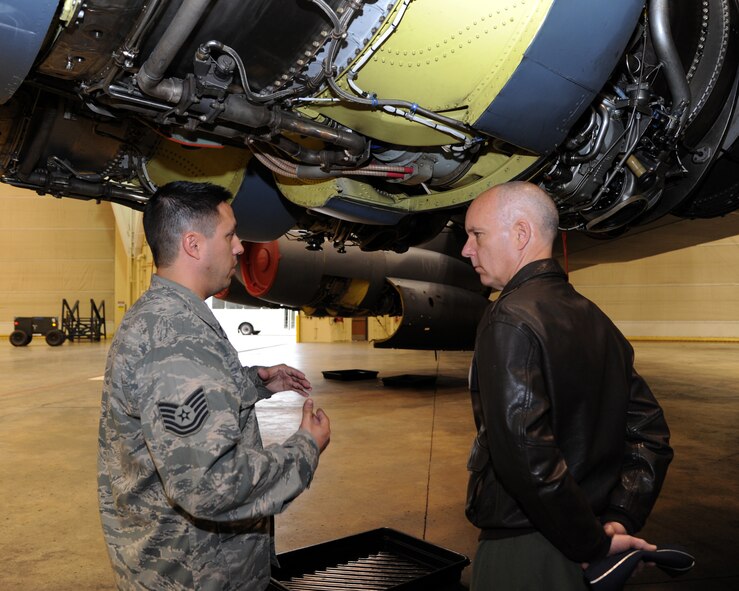 Tech. Sgt. Jerami Reyna, 2nd Maintenance Squadron phase dock chief, speaks with Brig. Gen. Michael Fortney, Air Force Global Strike Command director of operations, inside the phase hangar on Barksdale Air Force Base, La., Feb. 25, 2014. Reyna explained what processes occur when a B-52H Stratofortress arrives to the phase hangar. (U.S. Air Force photo/Senior Airman Joseph A. Pagán Jr.)