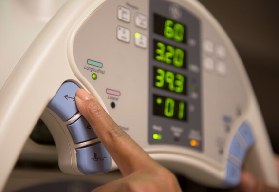 U.S. Air Force Master Sgt. Tracey McLendon, 23d Medical Support Squadron diagnostic imaging flight chief, uses an X-ray tube machine at the clinic on Moody Air Force Base, Ga., Feb. 25, 2014. The 23d MDSS radiology clinic averages roughly 2,600 exams per year. (U.S. Air Force photo by Senior Airman Tiffany M. Grigg/Released) 

