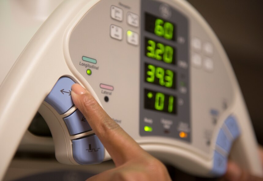 U.S. Air Force Master Sgt. Tracey McLendon, 23d Medical Support Squadron diagnostic imaging flight chief, uses an X-ray tube machine at the hospital on Moody Air Force Base, Ga., Feb. 25, 2014. The 23d MDSS radiology clinic averages roughly 2,600 exams per year. (U.S. Air Force photo by Senior Airman Tiffany M. Grigg/Released) 