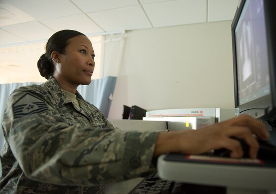 .S. Air Force Master Sgt. Tracey McLendon, 23d Medical Support Squadron diagnostic imaging flight chief, processes X-ray images at the clinic on Moody Air Force Base, Ga., Feb. 25, 2014. The 23d MDSS radiology clinic supports personnel in the 23d Wing, 93d Air Ground Operations Wing to include the military work dogs. (U.S. Air Force photo by Senior Airman Tiffany M. Grigg/Released) 

