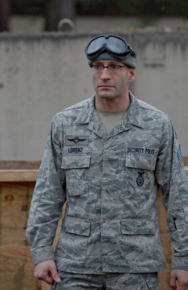 ZB-6 Marco Lorenz, 86th Security Forces Squadron tactical instructor, views the capabilities and techniques learned by students during a simulated active shooter training session Feb. 25, 2014, Ramstein Air Base, Germany. German civilian security police are an integral part to the overall security of Ramstein. (U.S. Air Force photo/Airman 1st Class Jordan Castelan)