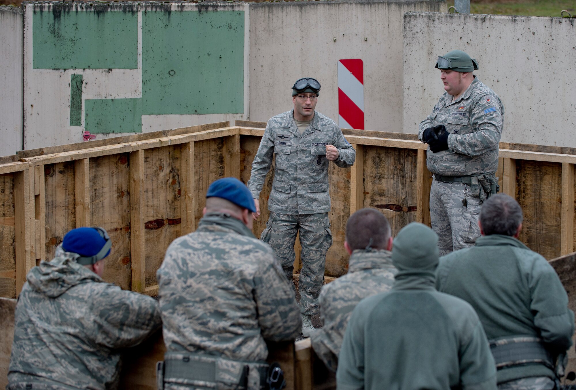 ZB-6 Marco Lorenz, 86th Security Forces Squadron tactical instructor, addresses a class of students on proper techniques to safely clear a room Feb. 25, 2014, Ramstein Air Base, Germany. German civilian security police are an integral part to the overall security of Ramstein. (U.S. Air Force photo/Airman 1st Class Jordan Castelan)