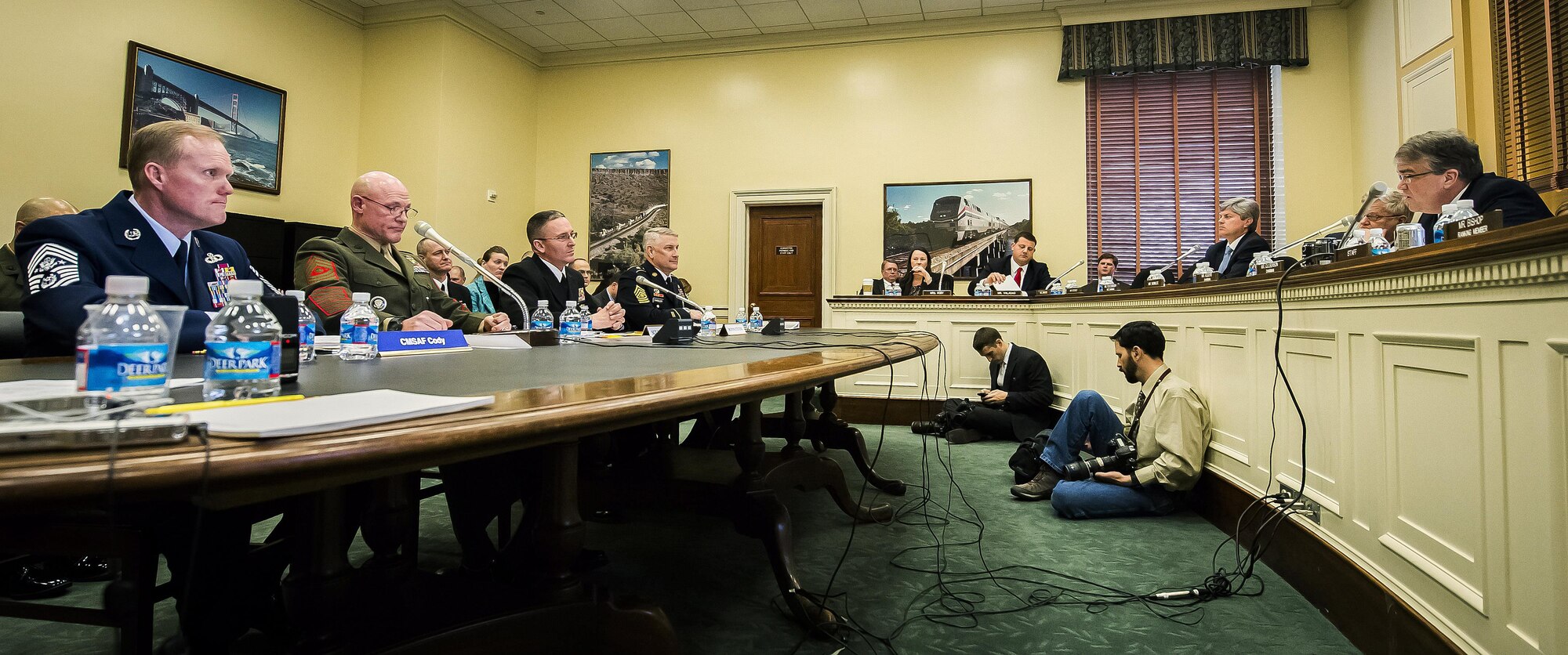 Chief Master Sgt. of the Air Force James A. Cody (left) listens to a question posed to him about the quality of life in the military during a hearing of the House Appropriations Committee, Subcommittee on Military Construction and Veteran's Affairs, Feb. 26, 2014, in Washington, D.C. With Cody on Capitol Hill were senior enlisted advisors for the other services: Sgt. Major of the Marine Corps Michael Barrett, Master Chief Petty Officer of the Navy Michael Stevens and Sgt. Major of the Army Raymond F. Chandler III. (U.S. Air Force photo/Jim Varhegyi)