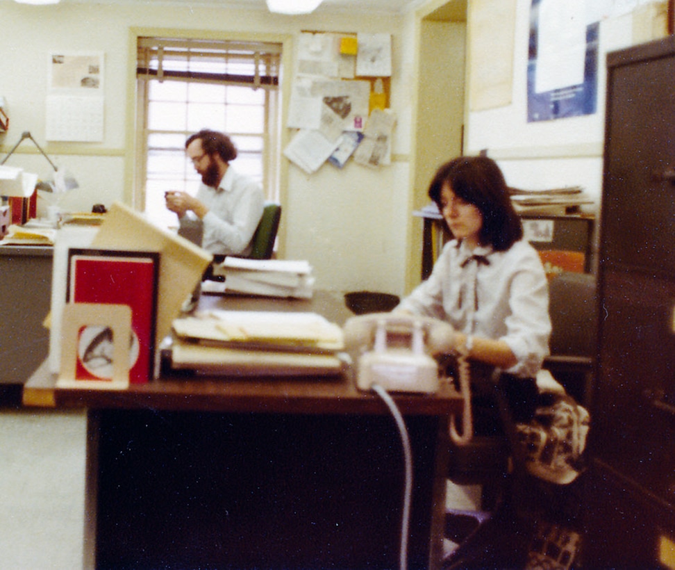 In 1980, Betty Grey Waring, environmental engineer, and her colleague, Richard Klein, civil engineer, work together in the Dredging Management Branch, housed on the second floor of the old Fort Norfolk barracks building 2. Foundation construction for their new headquarters, the Waterfield Building, had just begun.