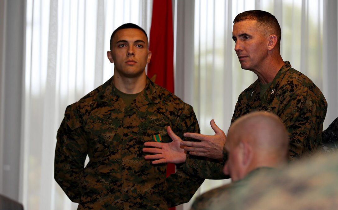 Col. John Farnam, commanding officer of Marine Corps Air Station Miramar, Calif., speaks to honored guests after the conclusion of the aircraft wing and installation’s quarterly awards ceremony aboard Marine Corps Air Station Miramar, Calif., Feb. 28. Farnam bade guests to come and shake the hands of excellent Marines and Sailors of the quarter and year for the installation and the wing. 