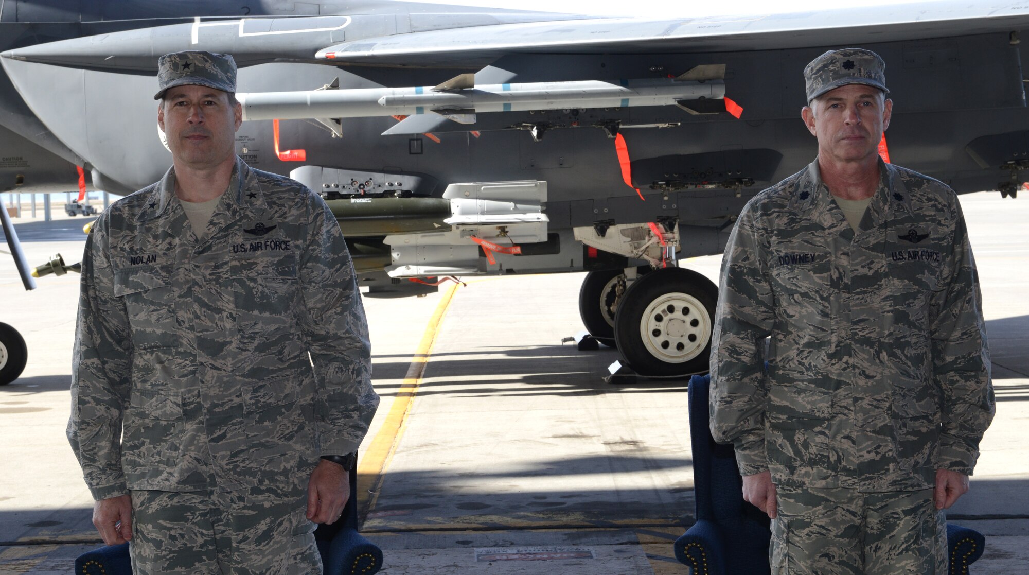 U.S. Air Force Brig. Gen. Michael Nolan, Idaho National Guard assistant adjutant general, and Lt. Col. Scott Downey stand at attention during the 266th Range Squadron assumption of command ceremony, Feb. 28, 2014, at Mountain Home Air Force Base, Idaho. (U.S. Air Force photo by Airman 1st Class Malissa Lott/RELEASED) 
