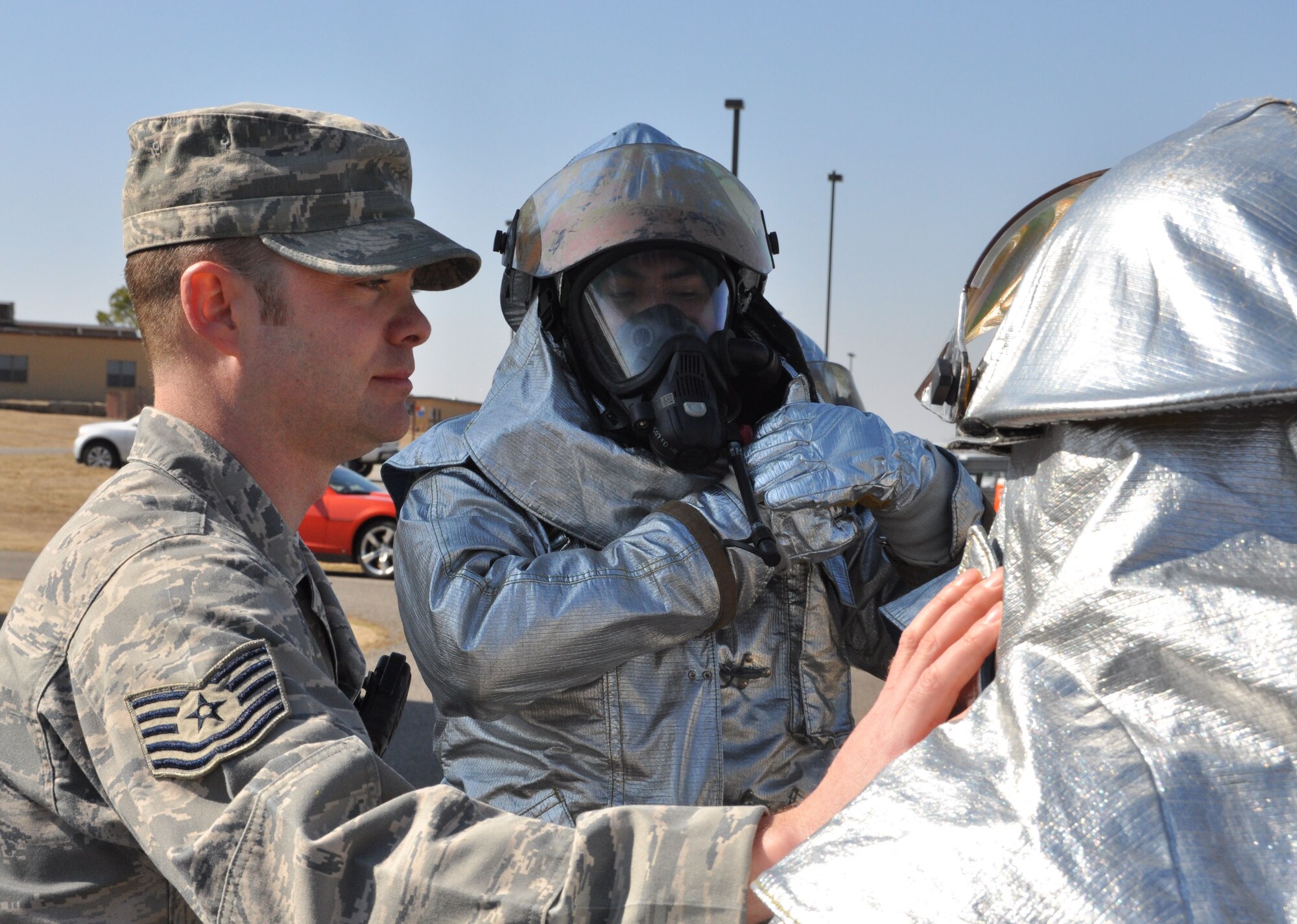 Tech. Sgt. Scott Lair provides instruction to members of the 507th Civil Engineer Squadron on the Joint Firefighter's Integrated Response Ensemble here during the March Unit Training Assembly. (U.S. Air Force Photo/Maj. Jon Quinlan)