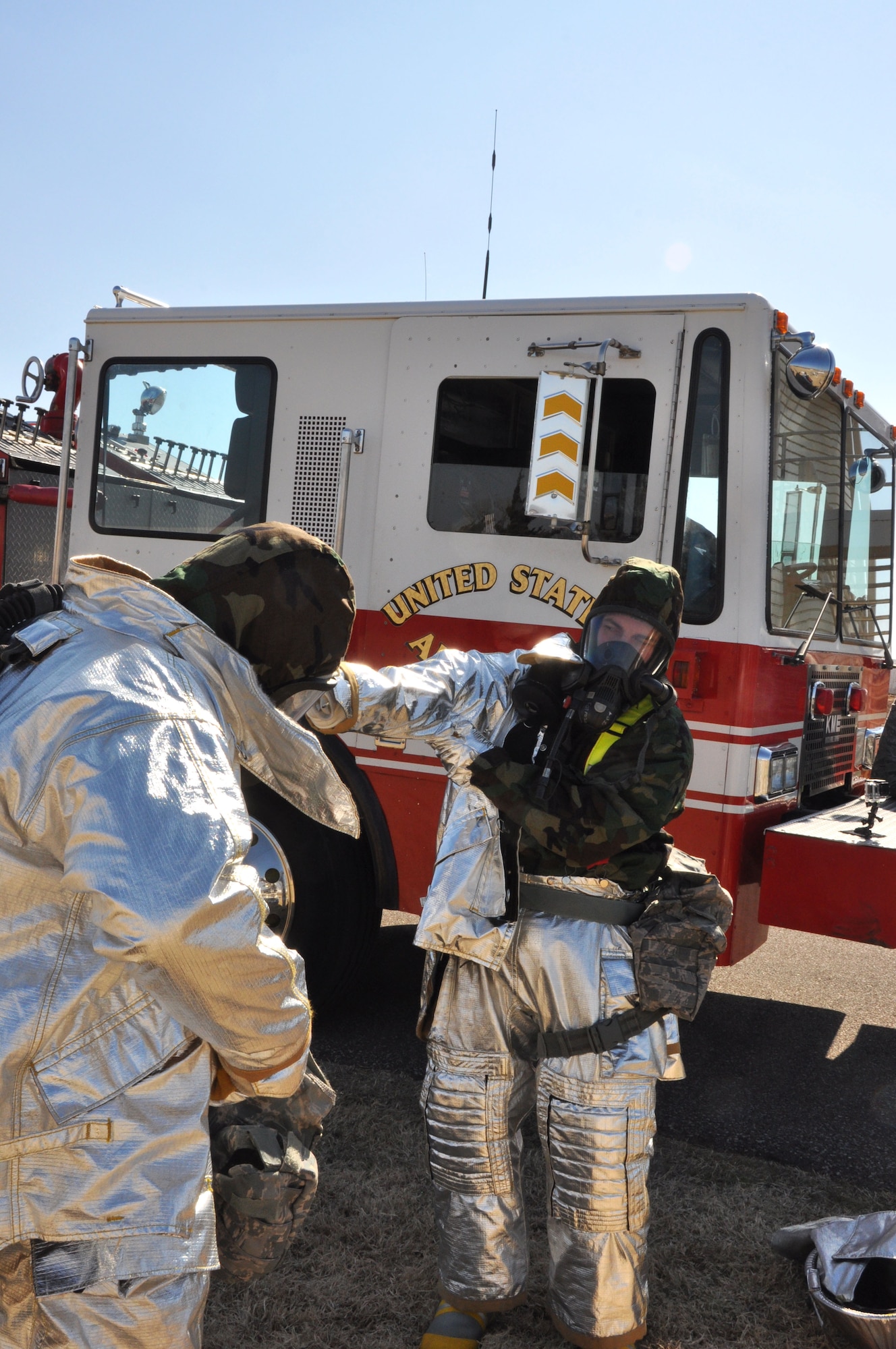 Reservists of the 507th Civil Engineer Squadron don the Joint Firefighter's Integrated Response Ensemble during the Unit Training Assembly here 28 Feb. (U.S. Air Force Photo/Maj. Jon Quinlan)