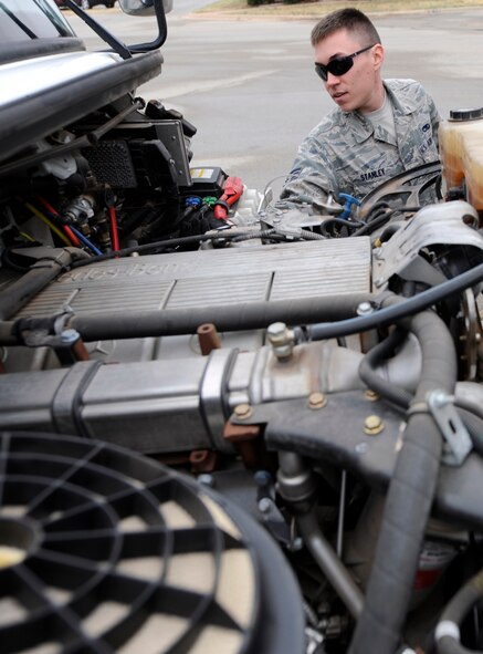 U.S. Air Force Senior Airman James Stanley, 7th Munitions Squadron, inspects a tractor trailer Feb. 25, 2014, at Dyess Air Force Base, Texas. Prior to operating a vehicle Airman must inspect each vehicle for safety and mechanical issues. (U.S. Air Force photo by Airman 1st Class Alexander Guerrero/Released)