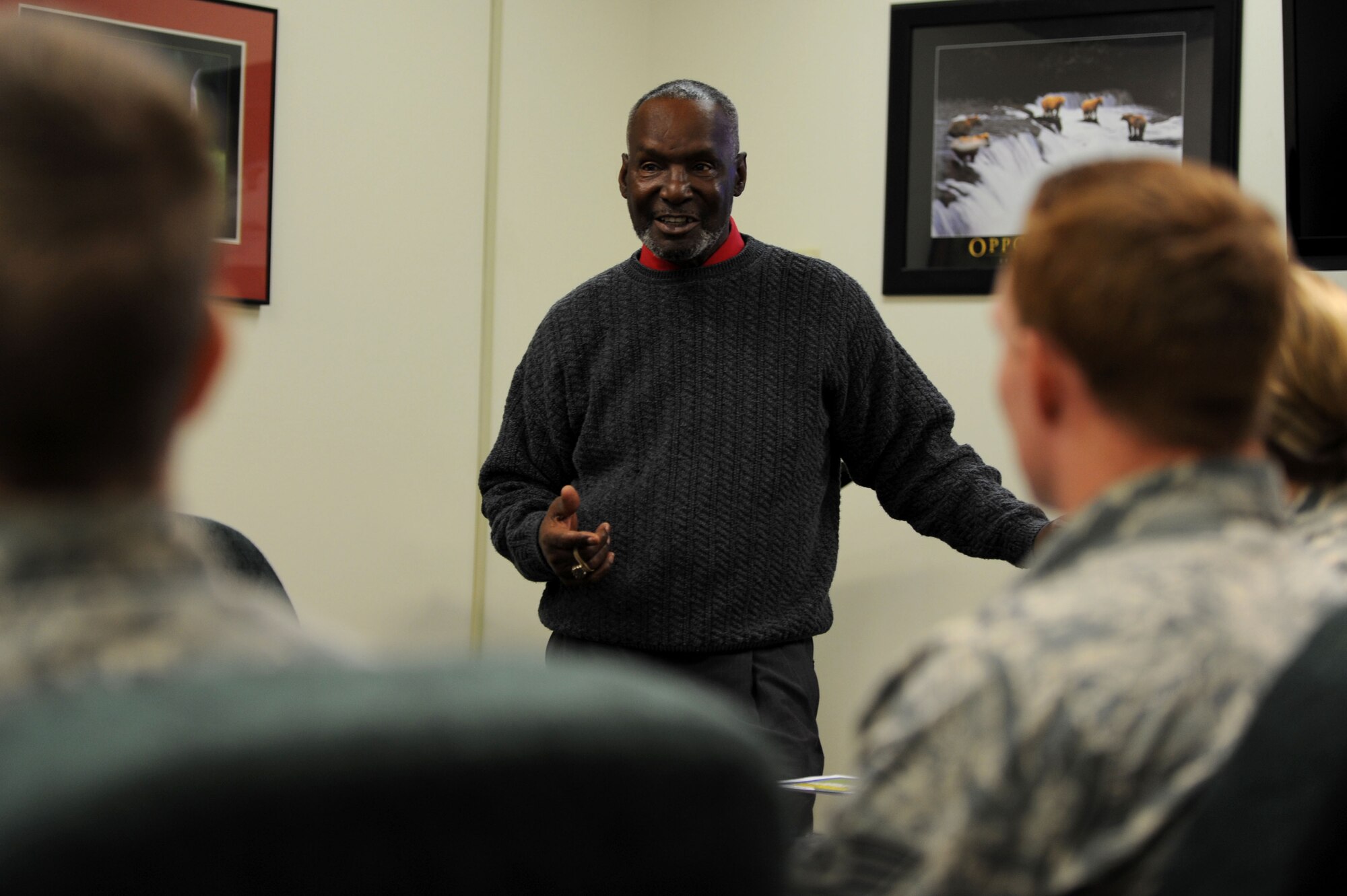 ALTUS AIR FORCE BASE Okla.—Esley Holmes, 97th Force Support Squadron Airman and Family Readiness center financial advisor, speaks to Airmen during a Military Saves Week class at the AFRC conference room Feb. 26, 2014.  Military Saves Week is a Department of Defense sponsored campaign for military members and their families to learn about healthy financial habits that promote better savings behavior.  (U.S. Air Force photo by Airman First Class Robert Gunn/Released) 