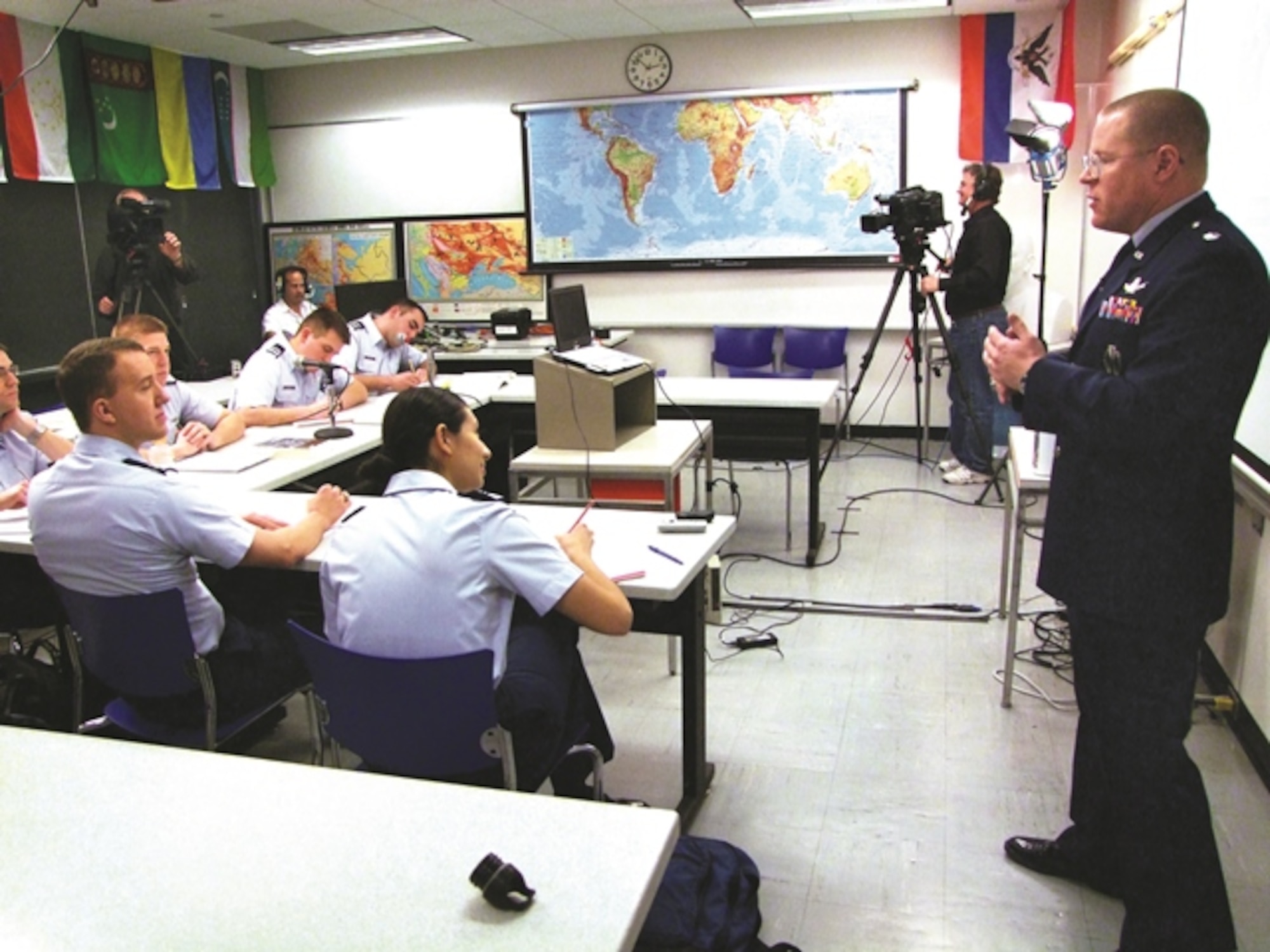 Lt. Col. Grant Weller, (right) the History Department’s deputy director, speaks to cadets during a History 368 – World War II course while a C-SPAN crew films the class for part of an ongoing series, “Lectures on History,” broadcast each weekend on C-SPAN 3. (Air Force photo/Amber Baillie)