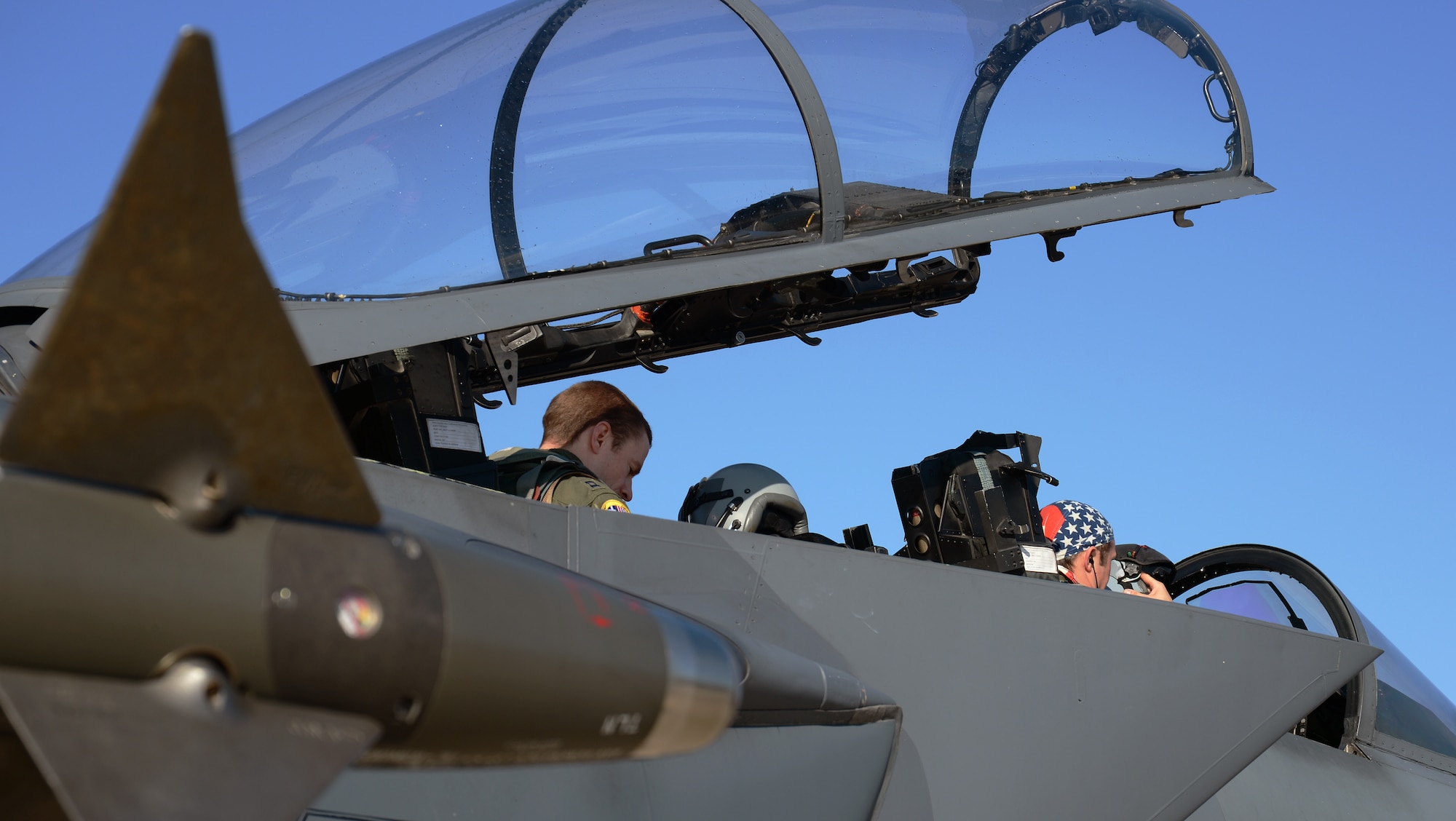 Capt. William Johnson, 494th Expeditionary Fighter Squadron weapon systems officer, and Capt. Adam Thompson, 494th EFS F-15E Strike Eagle pilot, prepare to launch on a training mission with the Hellenic air force at Souda Air Base, Greece, during a flying training deployment, Feb. 27, 2014. The mission exercised participating units in combined, air operations and extended joint, war-fighting capability through operational training. (U.S. Air Force photo by Staff Sgt. Thomas Trower/Released)