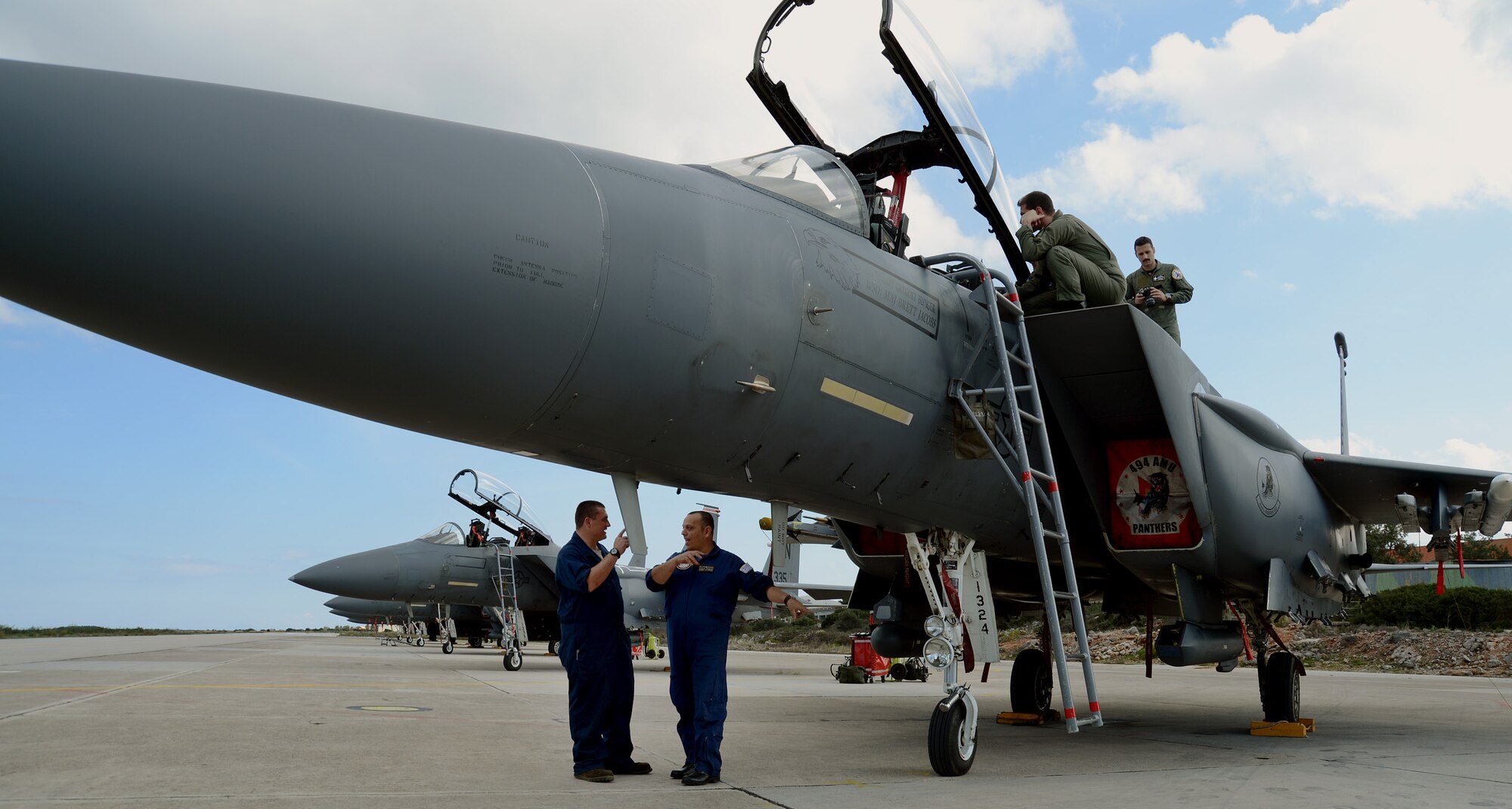 U.S. and Hellenic air force aircrew and maintainers tour a 494th Expeditionary Fighter Squadron F-15E Strike Eagle, at Souda Air Base, Greece, during a flying training deployment Feb. 27, 2014. Military relations between the U.S. and Greece date back to the early 19th century, when Greece was fighting for independence, as the two nations found commonality under their values of freedom and democracy. (U.S. Air Force photo by Staff Sgt. Thomas Trower/Released)
