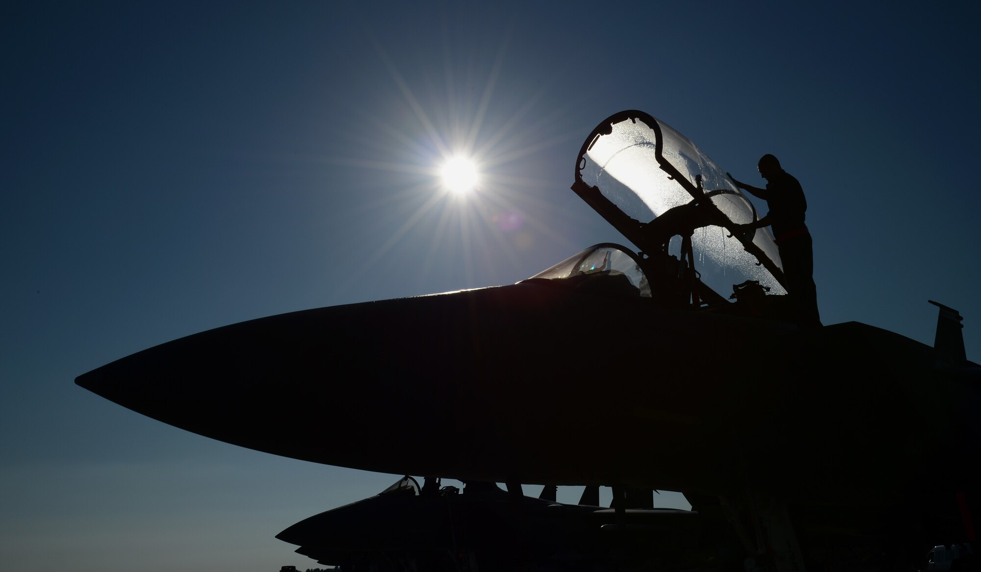 A 494th Expeditionary Fighter Squadron crew chief prepares an F-15E Strike Eagle for launch at Souda Air Base, Greece, during a flying training deployment with the Hellenic air force, Feb. 27, 2014. More than 250 Airmen deployed to Crete to work with NATO partners and build upon a strong military relationship. (U.S. Air Force photo by Staff Sgt. Thomas Trower/Released)