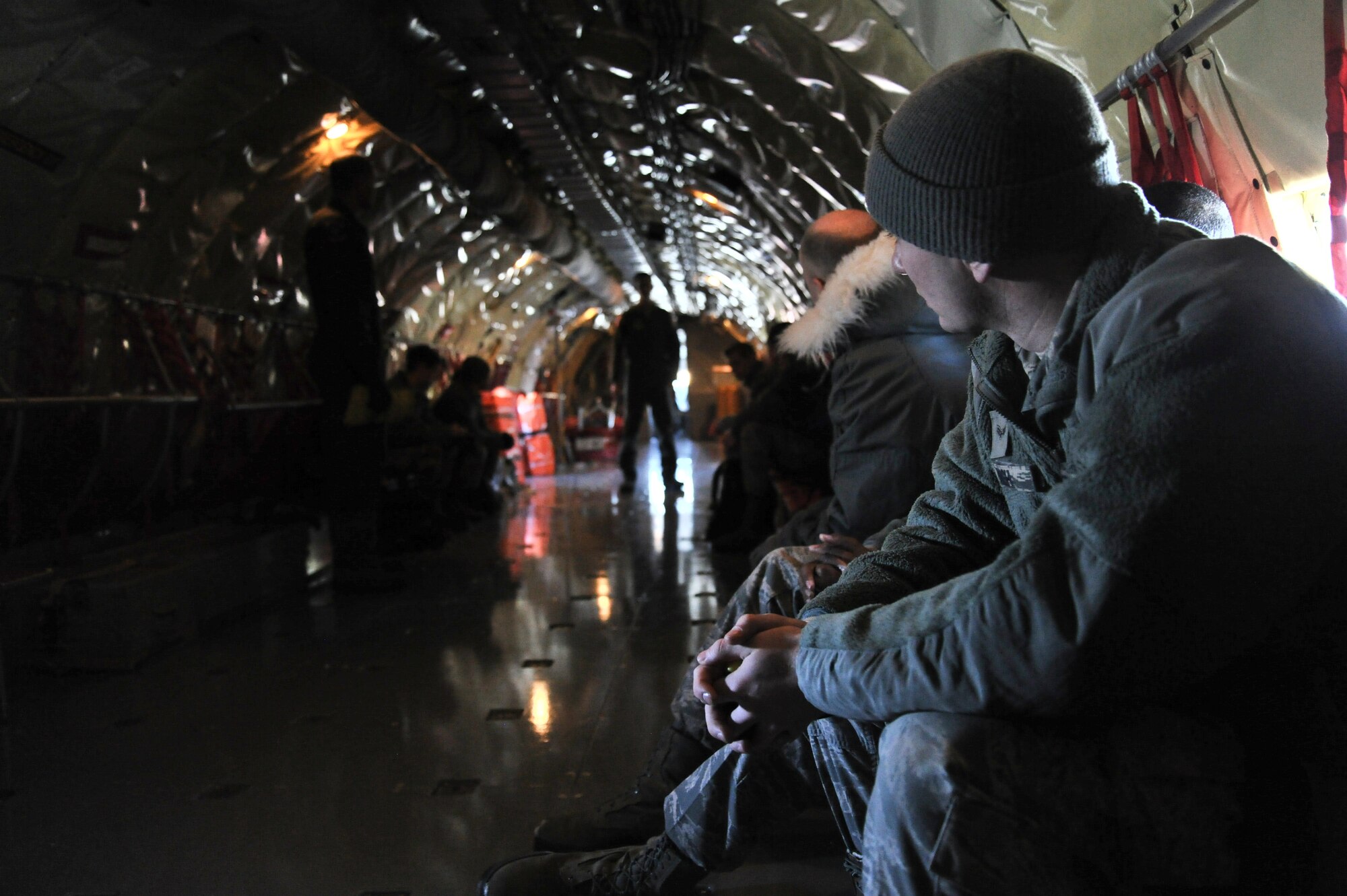 Fairchild Airmen listen to a safety brief prior to take off on a KC-135 Stratotanker incentive refueling flight at Fairchild Air Force Base Feb. 26, 2014.  The incentive flying programs are spread throughout the Air Force to entice good morale, a sense of purpose and recognition of a job well done. (U.S. Air Force Photo by Staff Sgt. Alexandre Montes)