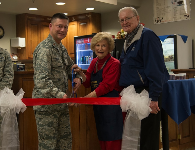 Dr. Lucy Greene, Parker Greene, Moody Support Committee chairman, and U.S. Air Force Maj. Jonathan Mizell, 23d Force Support Squadron commander, cut the ribbon at Lucy’s Corner Café at Moody Air Force Base, Ga., Feb. 26, 2014. The café, located at 23d Wing headquarters building, was dedicated in honor of Dr. Green for her and her husband’s support to the base. (U.S. Air Force photo by Airman Dillian Bamman/Released)