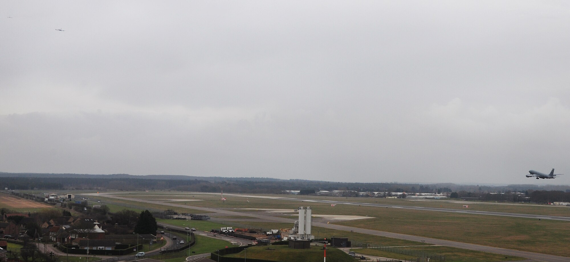 Three KC-135 Stratotankers assigned to the 100th Air Refueling Wing begin a training sortie after taking off Feb. 28, 2014, from RAF Mildenhall, England. Various squadrons assigned to the 100th ARW conduct training sorties regularly in order to stay mission ready.  The 351st Air Refueling Squadron has accomplished more than 450 sorties since the start of fiscal year 2014.  (U.S. Air Force photo by Staff Sgt. Rachel Waller/Released)  