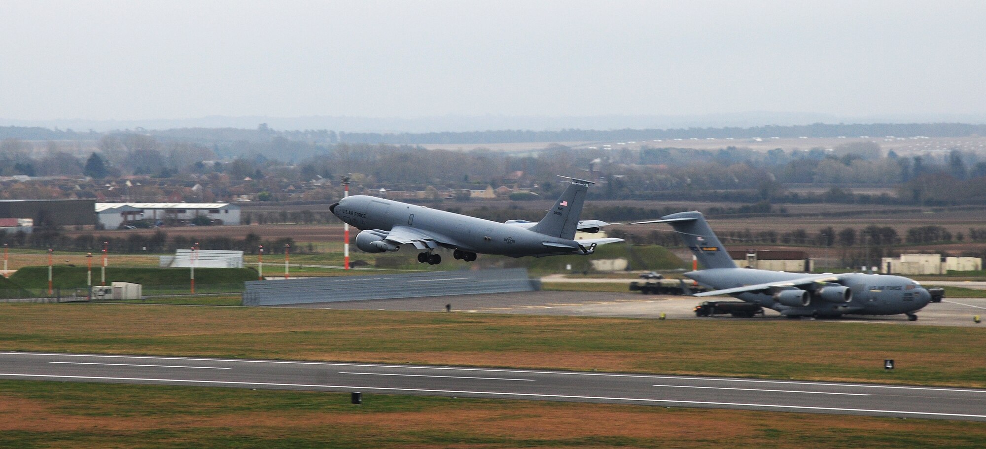 A KC-135 Stratotanker newly assigned to RAF Mildenhall, England, from Fairchild Air Force Base, Wash., takes off Feb. 28, 2014, at RAF Mildenhall. Various squadrons assigned to the 100th Air Refueling Wing conduct training sorties regularly in order to stay mission ready. Since the beginning of fiscal year 2014, the 100th ARW has refueled more than 1,300 aircraft. (U.S. Air Force photo by Staff Sgt. Rachel Waller/Released)