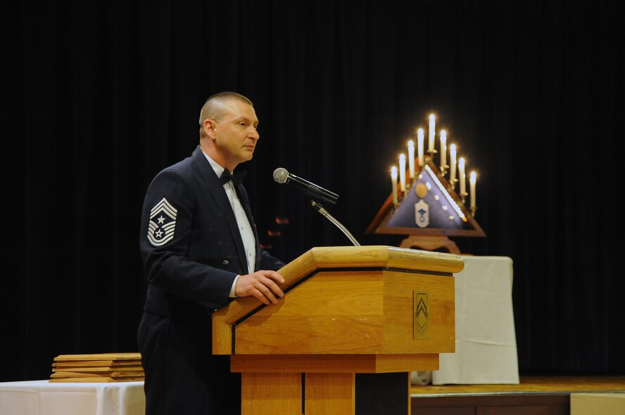 Chief Master Sgt. John Mazza, 56th Fighter Wing command chief, gives a closing statement to attendees at the ceremony. Mazza spoke about the five Airmen recognized for making the highest enlisted rank. (U.S. Air Force photo/Airman 1st Class Pedro Mota)