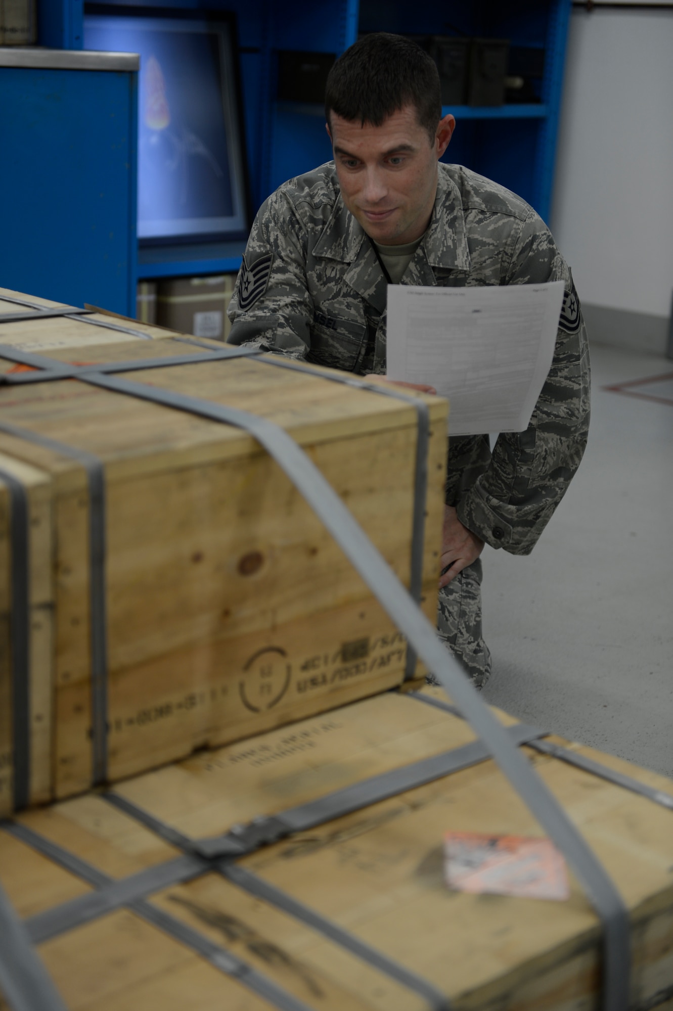 U.S. Air Force Tech. Sgt. Nathan Ansel, 52nd Equipment Maintenance Squadron senior munitions inspector from Ephrata, Pa., inspects crates of aircraft counter measure flares Feb. 26, 2014 on Spangdahlem Air Base, Germany. Munitions are inspected to insure that they are serviceable and ready to use on an aircraft. (U.S. Air Force photo by Staff Sgt. Christopher Ruano/Released)
