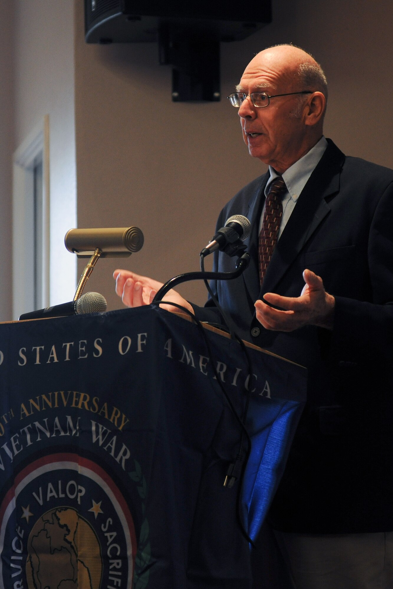 Retired U.S. Army Chaplain (Col.) William Carter speaks during the National Prayer Breakfast at RAF Croughton Feb. 13. Carter, who served two tours in Vietnam, and his fellow guest speaker, U.S. Air Force Chaplain (Capt.) Joseph Tran, 422nd Air Base Group deputy chaplain, shared their experiences from the Vietnam War with the audience, offering insight into the military and civilian sides of the war. (U.S. Air Force photo by Staff Sgt. Brian Stives)