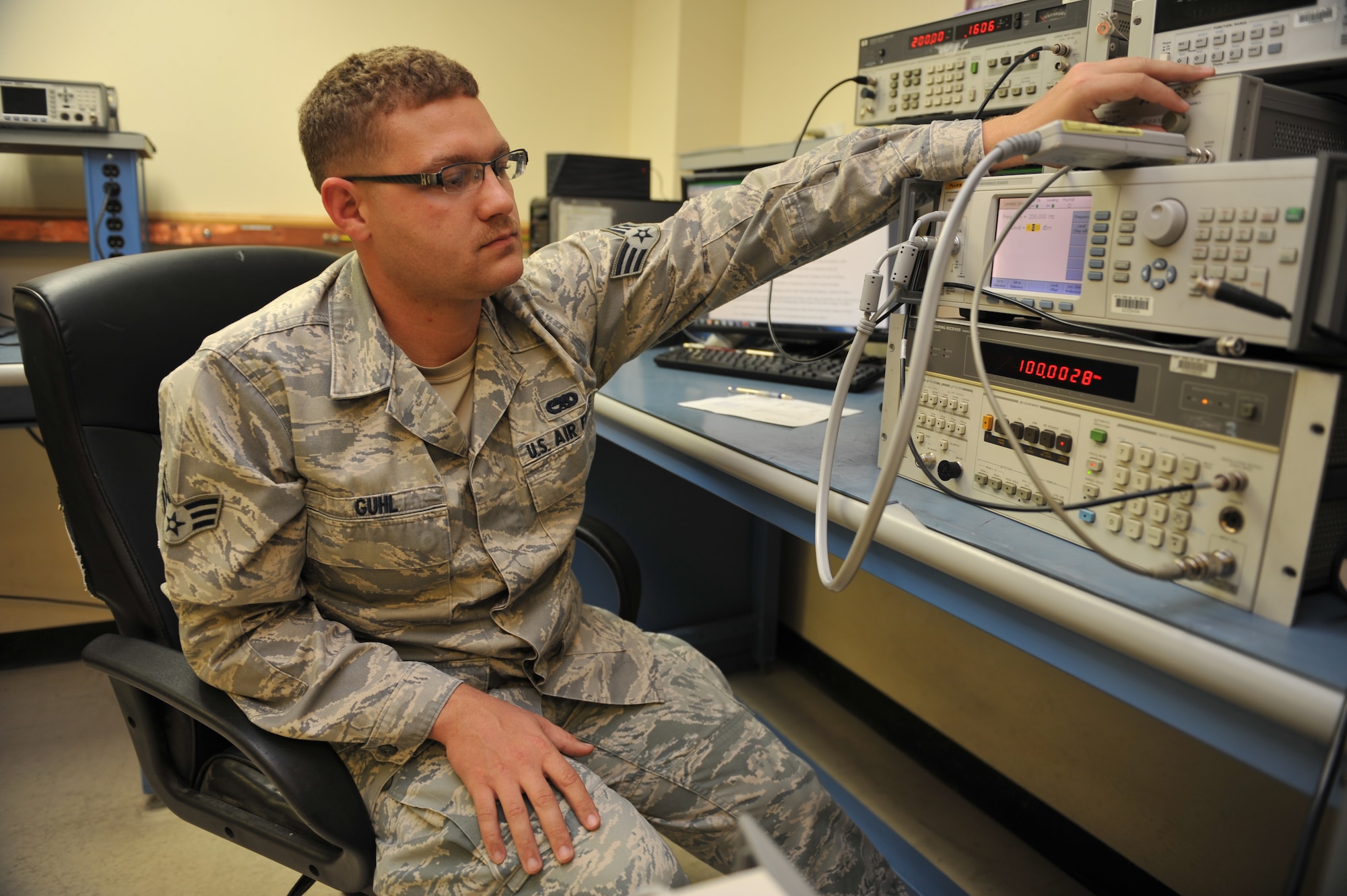 Senior Airman Christopher Guhl performs audio filter calibration on a 8902A measuring receiver at the 379th Expeditionary Maintenance Squadron Precision Measurement Equipment Laboratory, Al Udeid Air Base, Qatar, Feb. 25, 2014. Testing and validation of test equipment is vital for ensuring a units ability to test their own communications equipment. Guhl is a 379th EMXS PMEL technician deployed from Edwards Air Force Base, Calif., and a Three Rivers, Mich., native. (U.S. Air Force photo by Master Sgt. David Miller)