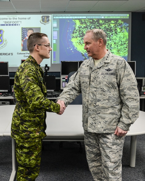 During his visit to Joint Base Lewis-McChord Air Force Chief of Staff, Gen. Mark Welsh, visited the Western Air Defense Sector to learn more about their mission and the professionalism within the sector.

“General Welsh has some very difficult decisions to make in the current political and fiscal climate. It is important for him to see the unparalleled professionalism, work ethic, and dedication displayed by the men and women of the Western Air Defense Sector,” said Col. Pete Stavros, WADS commander. “This type of exposure to our mission and unit will enable him to make well-informed decisions in the months and years ahead.”

As a part of his tour, Gen. Welsh recognized Sgt. Charles Ansell, a Canadian Forces member of WADS who serves as the noncommissioned officer in charge of surveillance with a coin.

“First the Seahawks win the Super Bowl and then I get the absolute honor to be recognized by the CSAF, General Welsh!  It was certainly an amazing week," said Sgt. Ansell. “It was a great honor to be recognized by General Welsh.  There are not too many Canadians with the CSAF coin!” (Courtesy photo)
