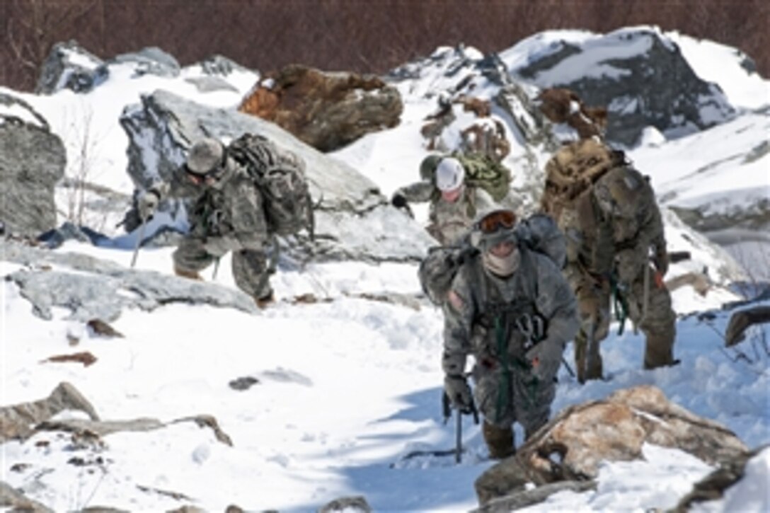 Soldiers climb Smugglers' Notch during a mountaineering exercise in Cambridge, Vt., Feb. 20, 2014. 