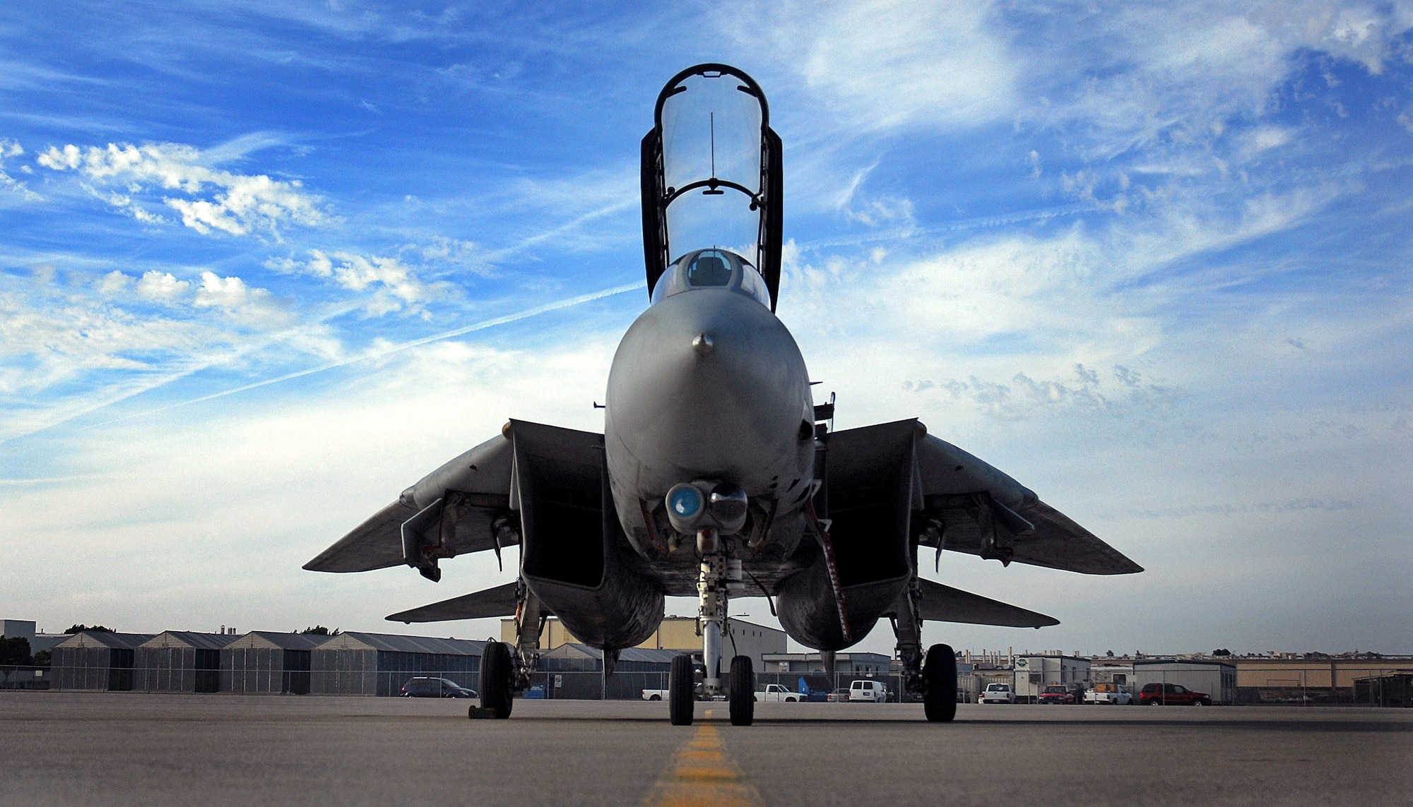 A U.S. Navy F-14 Tomcat aircraft sits on the flight line after completing its final flight at Naval Base North Island, San Diego, Calif., Sept. 29, 2006. After 36 years of service, the Tomcat was replaced by the F/A-18E/F Super Hornet aircraft. 