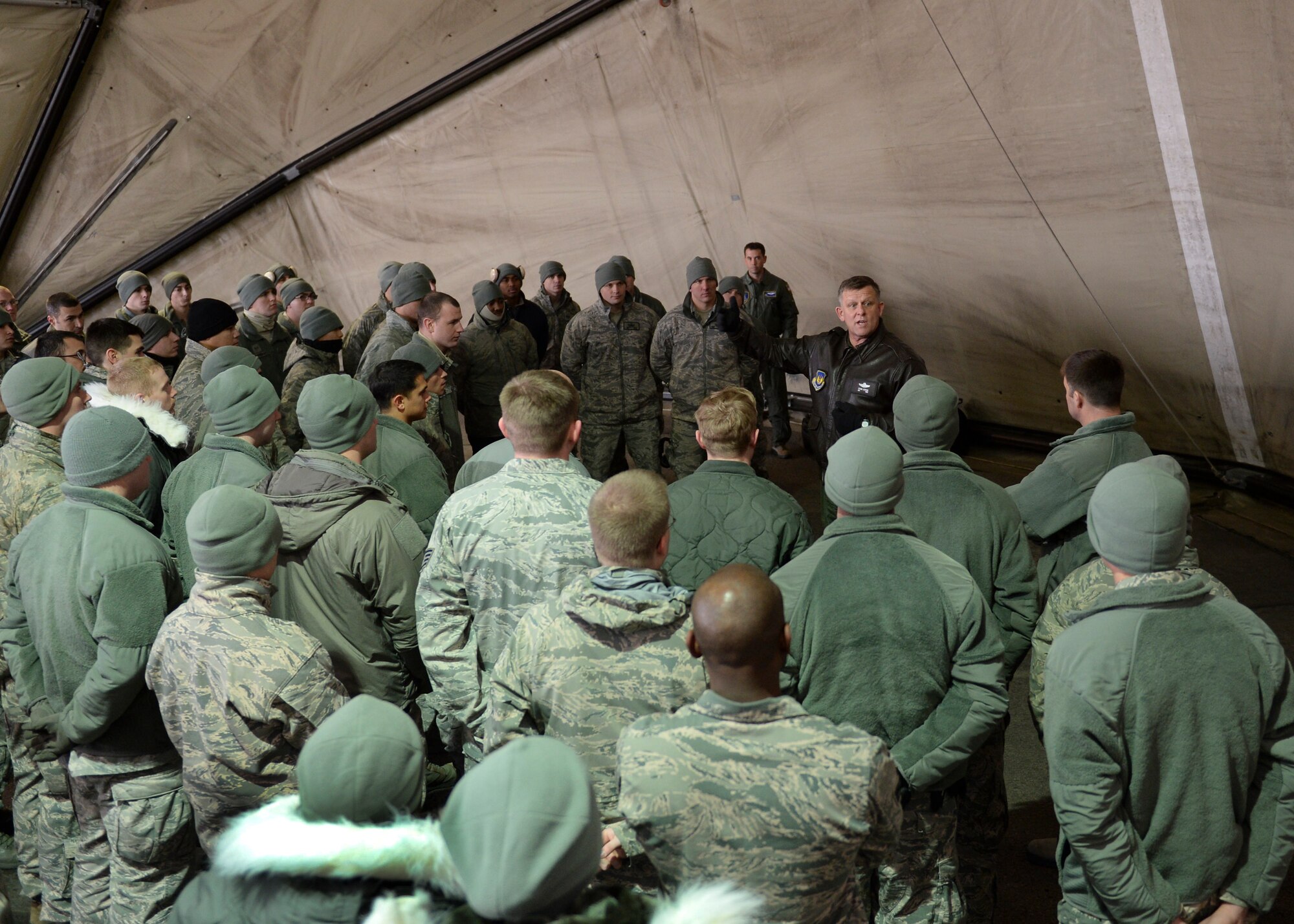 Gen. Frank Gorenc, U.S. Air Forces in Europe-Africa, commander addresses Airmen from the 48th Air Expeditionary Group during a visit to an Air Base in Siauliai, Lithuania, Jan. 3, 2013. Gorenc offered words of encouragement regarding the Baltic air policing mission and answered questions on a variety of topics. (U.S. Air Force photo by Airman 1st Class Nigel Sandridge/Released)
