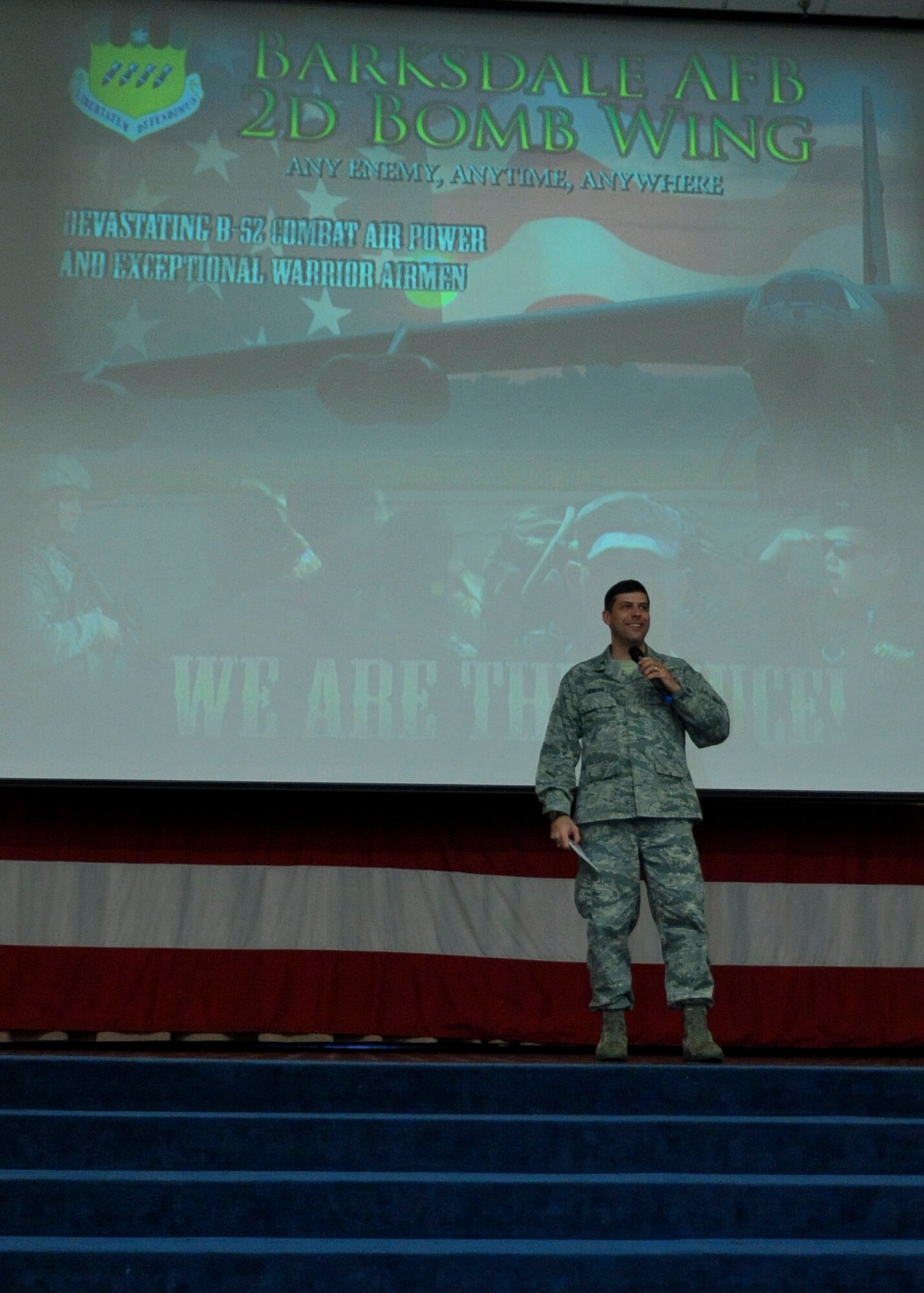 Col. Andrew Gebara, 2nd Bomb Wing commander, praises Team Barksdale Airmen on the accomplishments of 2013 during an all-call on Barksdale Air Force Base, La., Jan. 3, 2014. Some of the accomplishments included a zero discrepancy Initial Nuclear Surety Inspection and the Air Force Global Strike Command's first ever outstanding rating for a wing in a Nuclear Operational Readiness Inspection. (U.S. Air Force photo/Senior Airman Kristin High)
