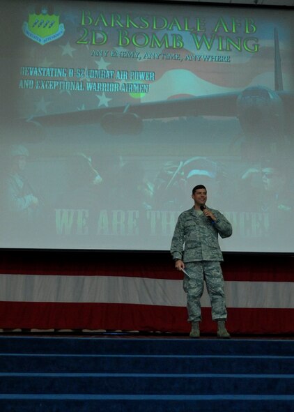 Col. Andrew Gebara, 2nd Bomb Wing commander, praises Team Barksdale Airmen on the accomplishments of 2013 during an all-call on Barksdale Air Force Base, La., Jan. 3, 2014. Some of the accomplishments included a zero discrepancy Initial Nuclear Surety Inspection and the Air Force Global Strike Command's first ever outstanding rating for a wing in a Nuclear Operational Readiness Inspection. (U.S. Air Force photo/Senior Airman Kristin High)
