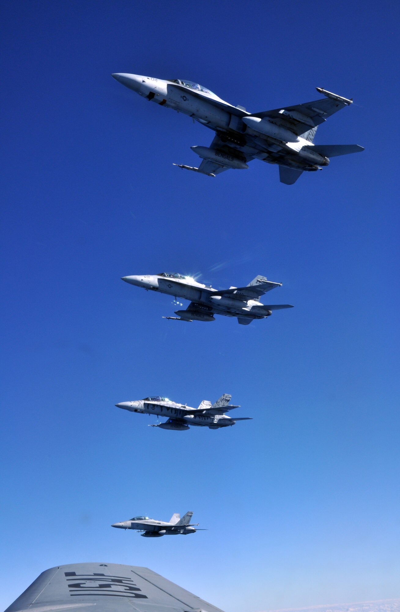 A KC-135R Stratotanker from the 916th Air Refueling Wing flies with four Marine F/A-18D Hornets during exercise Razor Talon on Dec. 13, 2013. The exercise is a recurring, monthly, large scale exercise flown over the mid-Atlantic coastline. (USAF photo by SSgt. Alan Abernethy, 916ARW/PA)