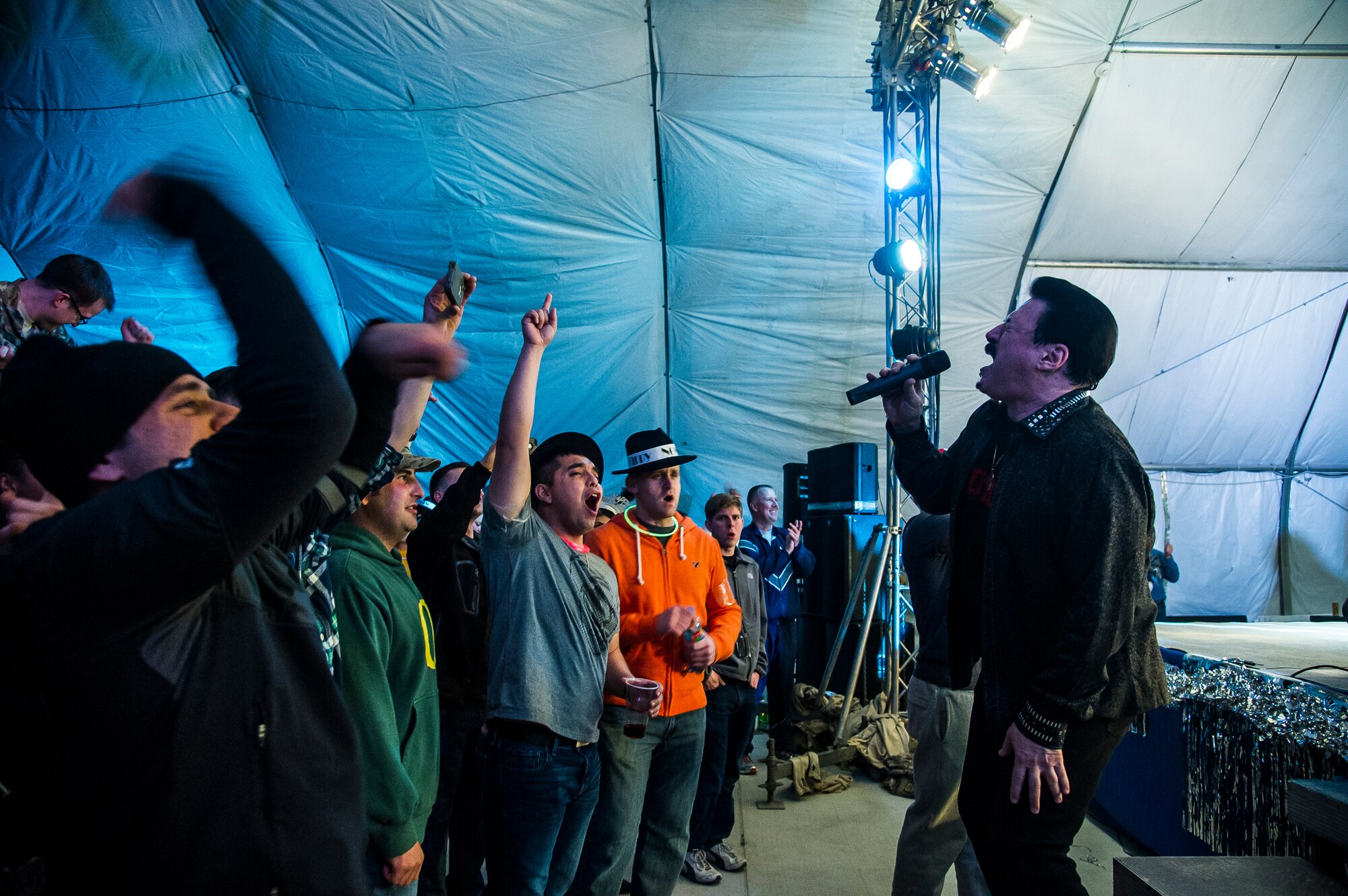 Bobby Kimball, TOTO frontman, sings during a concert at Transit Center at Manas, Kyrgyzstan, Dec. 31, 2013. Bobby Kimball, Alex Ligertwood and Bill Champlin performed for members of TCM to celebrate the New Year. More than 1200 Service members and civilian counterparts attended the event. (U.S. Air Force photo/Senior Airman George Goslin)