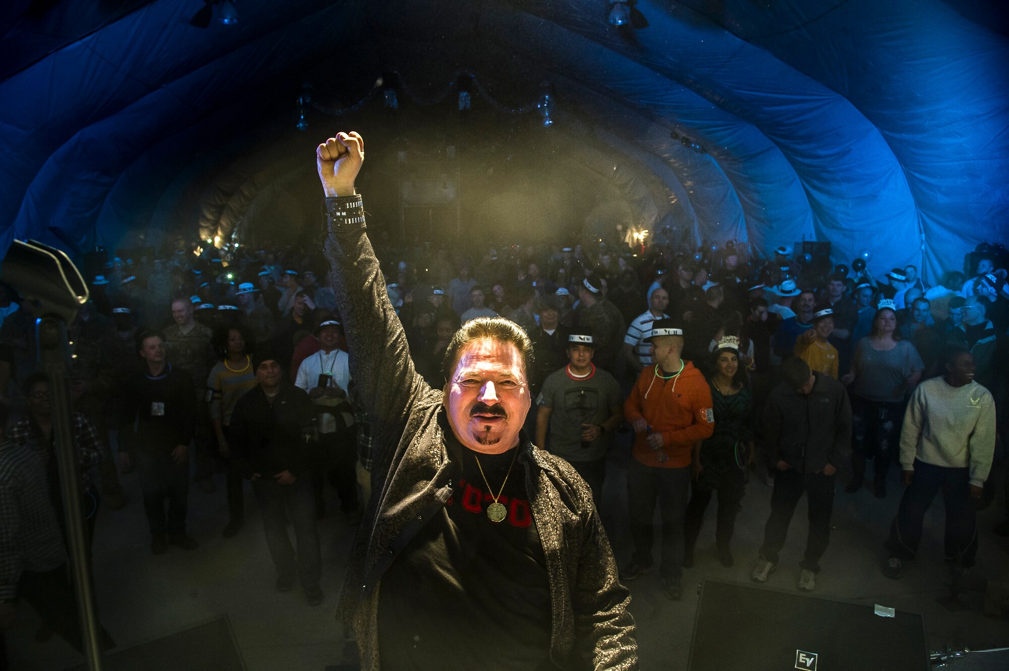 Bobby Kimball, TOTO frontman, finishes a performance at Transit Center at Manas, Kyrgyzstan, Dec. 31, 2013. Bobby Kimball, Alex Ligertwood and Bill Champlin performed for members of TCM to celebrate the New Year. More than 1200 Service members and civilian counterparts attended the event. (U.S. Air Force photo/Senior Airman George Goslin)