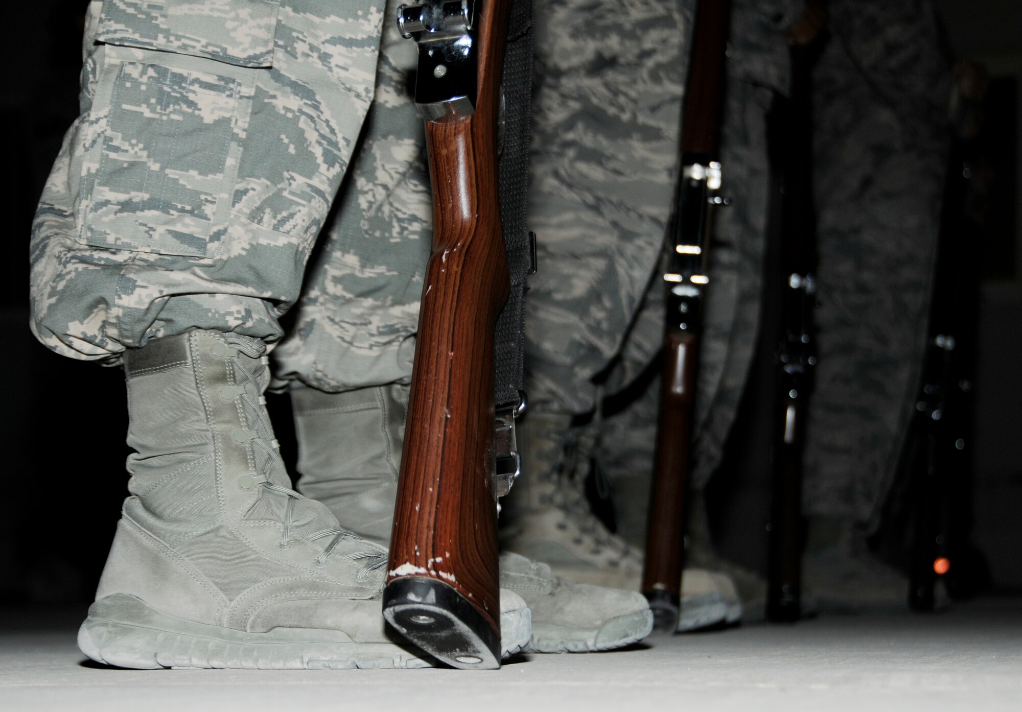 Members of the 379th Air Expeditionary Wing Honor Guard compete in a drill-off in Southwest Asia, Jan. 2, 2014. The Honor Guard holds drill-offs which consisted of rifle movements and commands to select who will participate in the next detail. The Honor Guard is made up of volunteer service members and practices two times a week to hone their skills. (U.S. Air Force photo/Senior Airman Hannah Landeros)