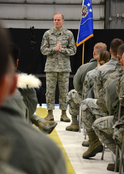 PEASE AIR NATIONAL GUARD BASE, N.H. -- Chief Master Sgt. of the Air Force James Cody addresses airmen Jan. 4, 2014, on Pease Air National Guard Base during an all-call session. Chief Cody opened the session with brief remarks then fielded several questions concerning enlisted members across the Air Force and Air National Guard. The Air Force's most senior enlisted member visited Pease ANGB to speak with enlisted Airmen and observe the unique capability they provide to the state of New Hampshire and the Air Force. (N.H. National Guard photo by Airman 1st Class Kayla M. McWalter/Released)